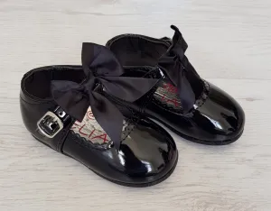 Black patent bow shoes