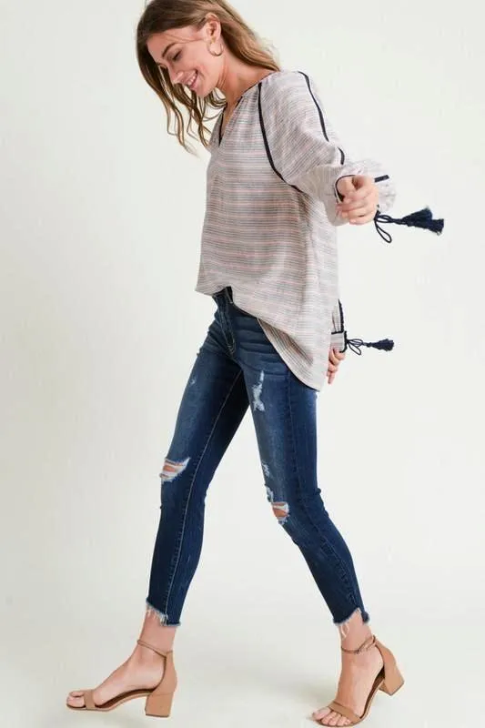 NAVY STRIPED V- NECK BLOUSE W/TASSEL CUFFS