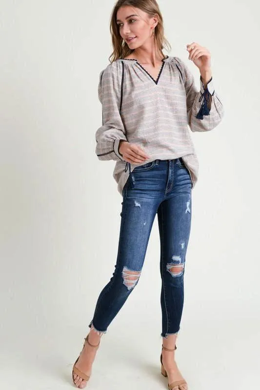 NAVY STRIPED V- NECK BLOUSE W/TASSEL CUFFS